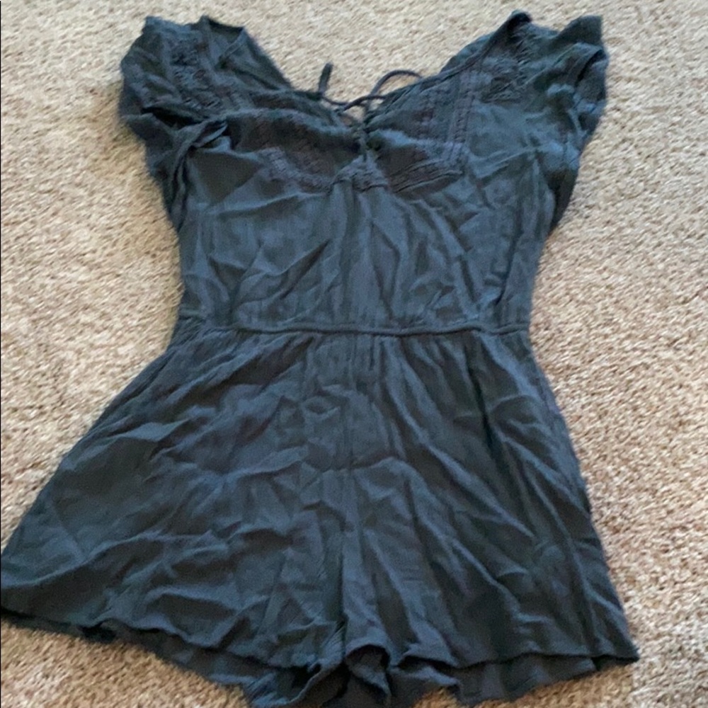 green teal colored romper worn a few times